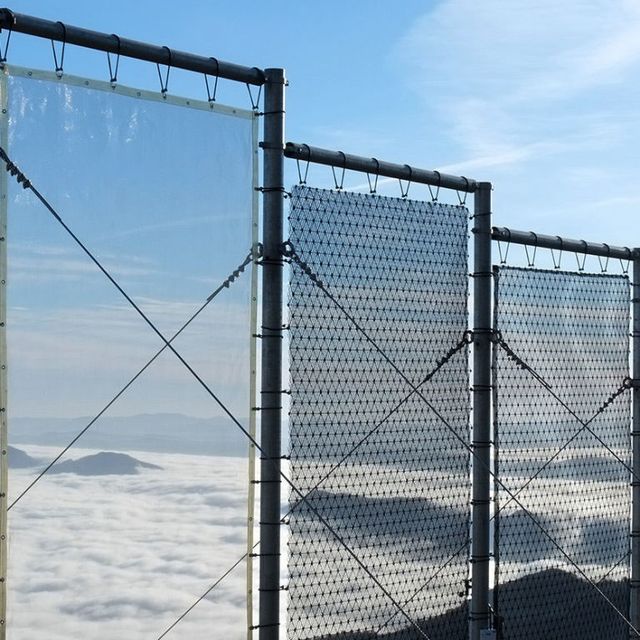 Sky, Mesh, Iron, Wire fencing, Metal, Composite material, Chain-link fencing, Fence, Steel, Building material, 