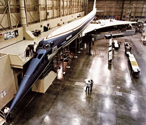 <p>The 2707 was the United States' first try at developing a commercial SST. The aircraft's design had a drooping nose similar to the Concorde's, though it was intended to be much larger and fly much faster than the European jet. Designs accounted for a maximum capacity of 300 passengers and a cruising speed of Mach 3. </p><p>The original design for the Boeing 2707 also incorporated a swing wing platform, allowing the wings to stay straight on takeoff and landing for increased stability, but retract into a swept position for improved aerodynamics at supersonic speeds. The mechanism needed proved too heavy, however, and engineers were forced to scrap the idea and redesign the plane with a traditional delta wing.</p><p>Construction started in the late '60s on two 2707 prototypes, but trouble developing a metal skin that could withstand the extreme heat of supersonic speed, as well as environmental and noise pollution concerns, led the government to pull funding for the project in 1971. </p>