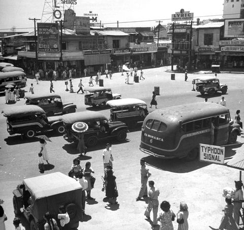 Jeepneys and converted Army trucks and weapon carriers, travelling up and down the Plaza Miranda