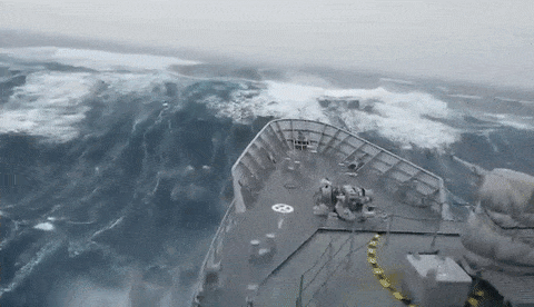 Watch This Navy Ship Take On A Truly Gigantic Wave