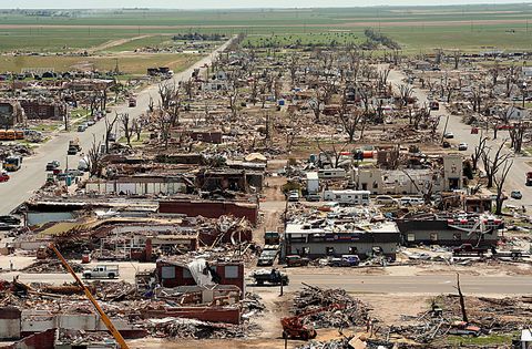 <p>The localized, devastating effects of great tornadoes can wipe a city off the map while leaving its neighbors nearly untouched. In 2007 the unlucky victim was Greenburg. About 95 percent of the town was destroyed, and the rest severely damaged. Eleven people were killed and about half the population left for good. </p><p>Afterward, the town decided to rebuild in an unusual way: by living up to its name. All new buildings are Leadership in Energy and Environmental Design (LEED) certified and run on <a href="http://www.go100percent.org/cms/index.php?id=70&tx_ttnews%5Btt_news%5D=59">100 percent renewable energy</a>. Of the rebuilding efforts, <a href="http://www.npr.org/2014/02/09/274227035/kansas-mayor-says-sustainability-is-about-community-not-politics">Mayor Bob Dixson said</a>, "we realized our heritage and ancestors were based on those sustainable, green principles." </p>