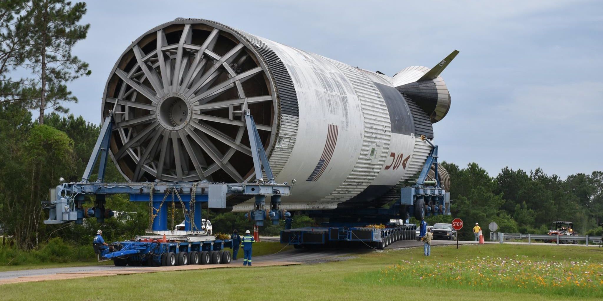 How Saturn V Rocket Booster Rolls Down A River