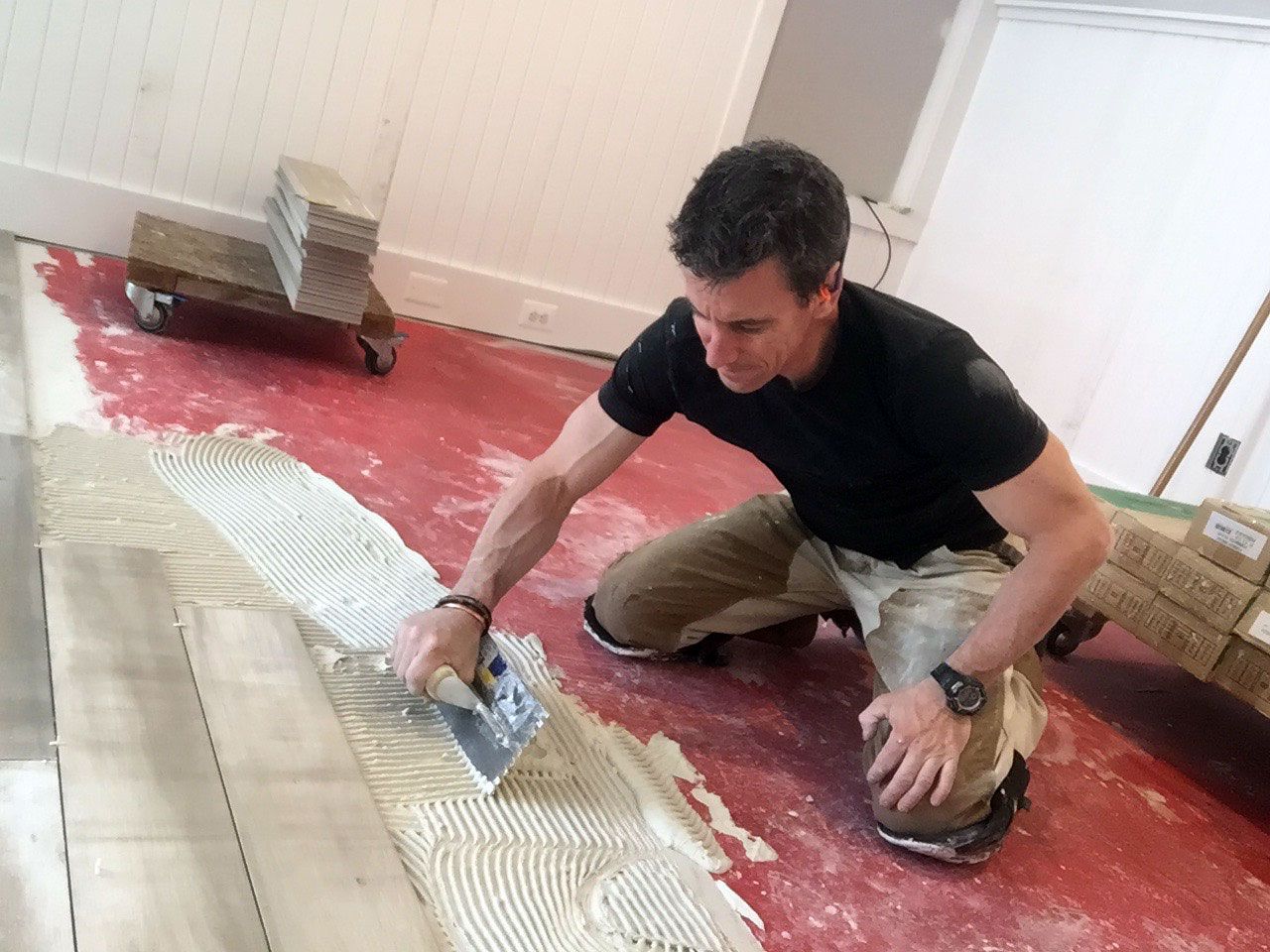 Man Applying The Screed To The Shower Base Shower Base Concrete