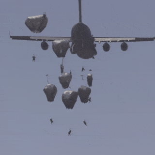Paratroopers Jumping Out of a Plane