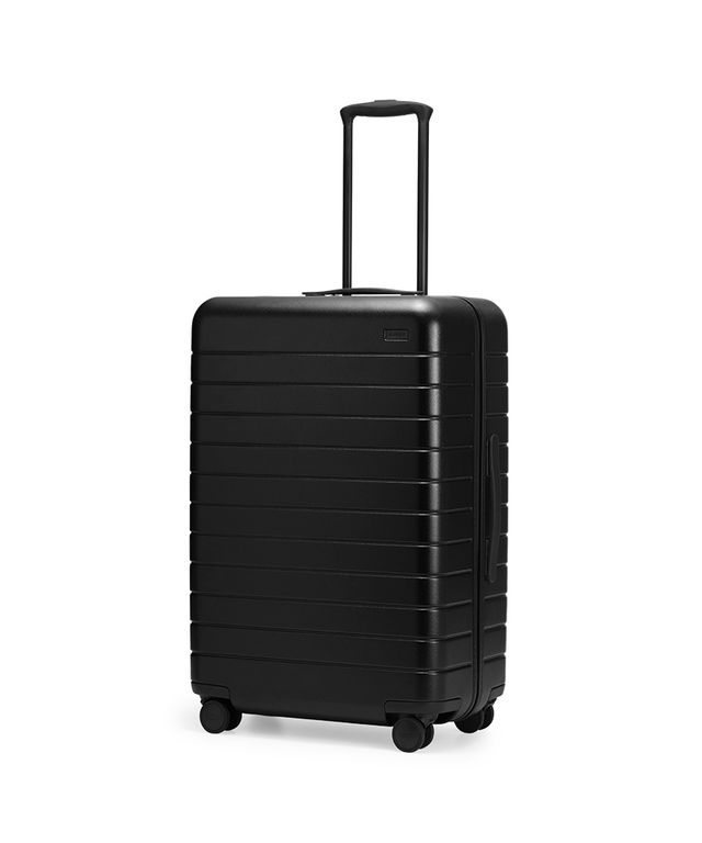 AWAY Bigger Carry-On Suitcase  Bigger & optional phone charger