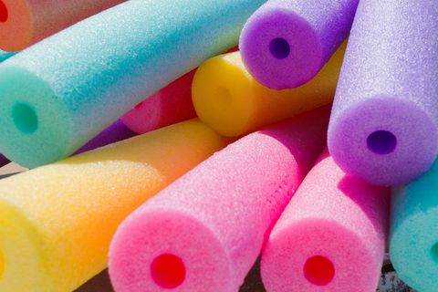 <p>Pool noodles come in handy for more than relaxing in the water. If your garage's parking space is tight, they're a great way to prevent <a href="https://www.yourmechanic.com/article/how-to-fix-car-dents-by-brady-klopfer"><u data-redactor-tag="u">door dings</u></a>. Affix them horizontally against the wall of your garage. When your door swings open, they'll provide a soft bumper so you don't bang up your car or the wall. You may also want to put one where the front of your car goes, so you can pull all the way forward without worrying about bumper damage.</p>