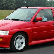 <p>The early 1990s was a good time for rally cars–Mitsubishi began campaigning the Lancer Evolution, Toyota had the Celica GT-Four, the Lancia Delta Integrale was still winning races, and Ford had this, the Escort RS Cosworth. This nutty three-door was a homologation special for Ford's Group A rally program, and came equipped with a Cosworth-designed four-cylinder and a glorious rear wing.</p>