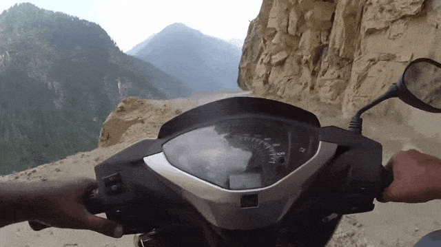 Moped on a Cliff