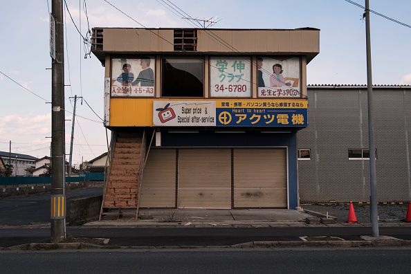 A shuttered computer store and tutoring center in Namie.