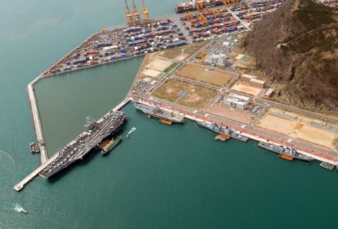 Artificial island, Aerial photography, Port, Aircraft carrier, Vehicle, Infrastructure, Dock, Ship, Watercraft, Island, 