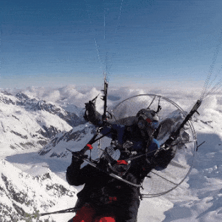 Paraglider Skiing