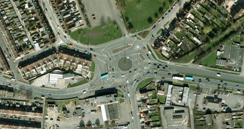 <p>With five points of entry—including the original Drove Road—the Magic Roundabout, as its known to the locals, is a fixture of Swindon, England.&nbsp;With five mini-roundabout encircling a central roundabout, traffic on the mini versions move clockwise, allowing for counterclockwise movement of traffic on the larger, internal portion. Yeah, it's weird<span class="redactor-invisible-space" data-verified="redactor" data-redactor-tag="span" data-redactor-class="redactor-invisible-space">.</span></p><p><span class="redactor-invisible-space" data-verified="redactor" data-redactor-tag="span" data-redactor-class="redactor-invisible-space"><iframe width="500" height="281" src="//www.youtube.com/embed/HuKWHR5omU8" frameborder="0" allowfullscreen=""></iframe><span class="redactor-invisible-space" data-verified="redactor" data-redactor-tag="span" data-redactor-class="redactor-invisible-space"></span><br></span></p>