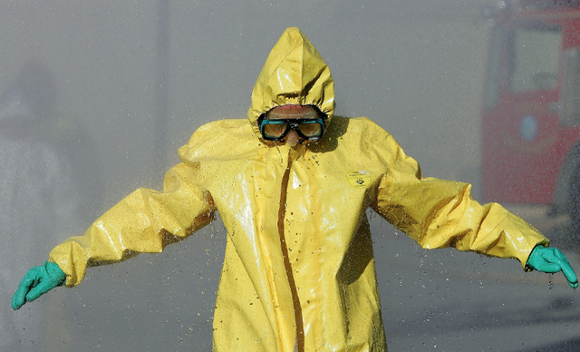 Outerwear, Hazmat suit, Yellow, Raincoat, Personal protective equipment, Jacket, Sleeve, 