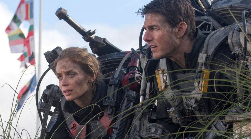 emily blunt and tom cruise in a scene in the edge of tomorrow