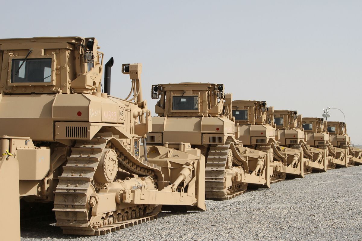 Vehicle, Military vehicle, Construction equipment, Motor vehicle, Mode of transport, Military, Bulldozer, Transport, Artillery tractor, Combat vehicle, 