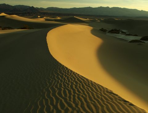 <p>In 1913, the Death Valley area of California reached 134 degrees Fahrenheit. The low elevation of the valley creates an oven where temperatures spike up high.</p><p>This happened on July 10 and was certainly a big outlying event. Usually temperatures there hover closer to 125 degrees in July, though the past few years have seen spikes of up to 129 degrees.</p><p>Don't worry, though. It's a desert, so it's a&nbsp;<em data-verified="redactor" data-redactor-tag="em">dry&nbsp;</em><span class="redactor-invisible-space" data-verified="redactor" data-redactor-tag="span" data-redactor-class="redactor-invisible-space">heat.&nbsp;</span></p><p><span class="redactor-invisible-space" data-verified="redactor" data-redactor-tag="span" data-redactor-class="redactor-invisible-space">Temperatures in Libya were believed to have beaten this record in the 1920s when their mercury hit 136 degrees, but several errors may have <a href="http://www.guinnessworldrecords.com/world-records/highest-recorded-temperature" data-tracking-id="recirc-text-link">driven up the result</a>. But the Death Valley temperature record is itself <a href="https://www.washingtonpost.com/news/capital-weather-gang/wp/2016/07/22/two-middle-east-locations-hit-129-degrees-hottest-ever-in-eastern-hemisphere-maybe-the-world/?utm_term=.95f60a841073" data-tracking-id="recirc-text-link">subjected to frequent scrutiny</a>.&nbsp;</span></p>