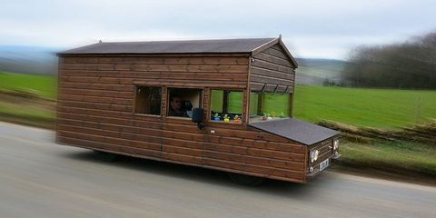 Wood, Transport, Property, Roof, Composite material, Concrete, Shade, Outdoor structure, Mobile home, Lumber, 