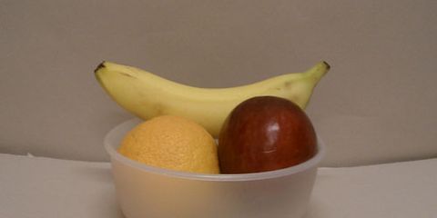 A fruit bowl taken from about 4 feet away with 6 fluorescent ceiling lights on.