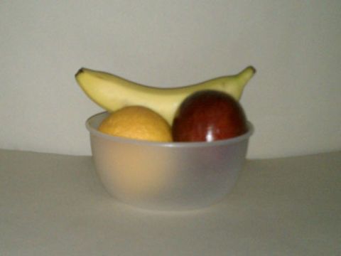The same fruit bowl with the lights off, but the door open (in near complete darkness).