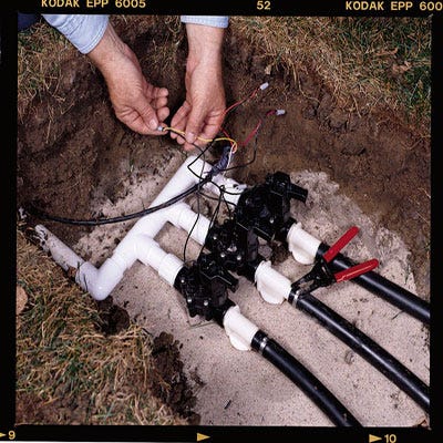 How To Install A Sprinkler System Installing An Underground Image