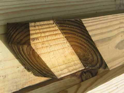 Yellow wood treated lumber