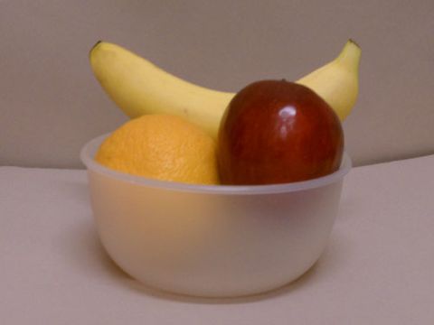 A fruit bowl taken from about 4 feet away with 6 fluorescent ceiling lights on.