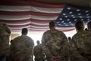 File photo shows staff at Heathe N. Craig Joint Theatre Hospital waiting to greet wounded veterans during 'Operation Proper Exit' at Bagram Airfield in Afghanistan.