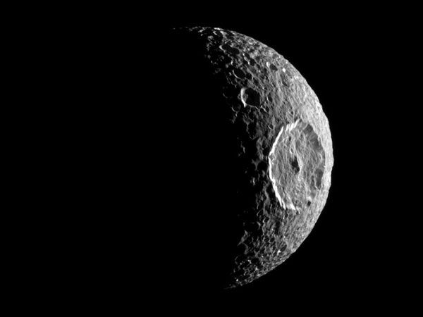 Saturn's Death Star Moon Is Hiding Something