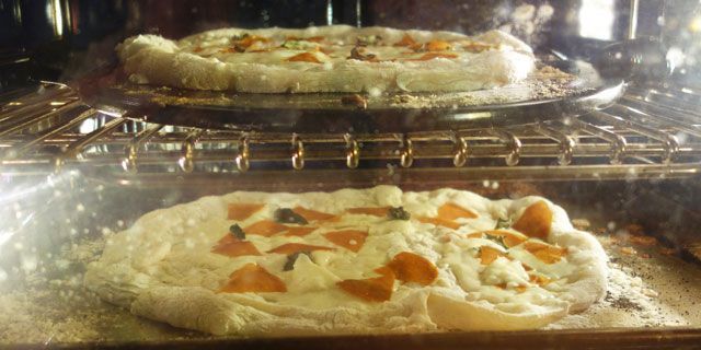 pizza on cookie sheet