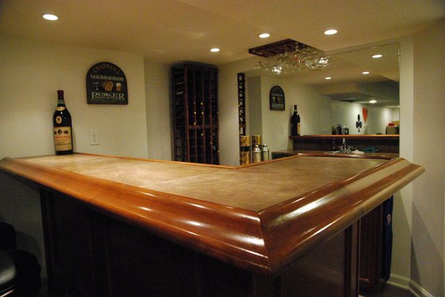 Countertop, Room, Furniture, Property, Lighting, Cabinetry, Interior design, Table, Basement, Wood, 