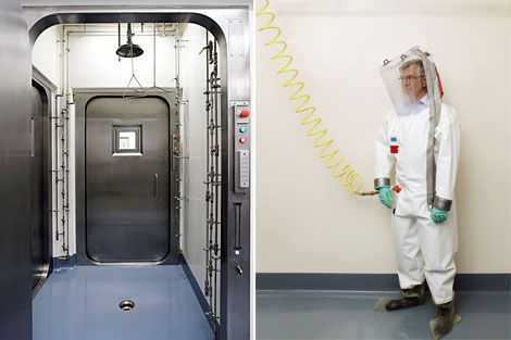 The air-lock entrance to the lab's hot zone. Right: A biohazard suit protects Peter Jahrling, chief virus hunter at the Integrated Research Facility in Fort Detrick, Md