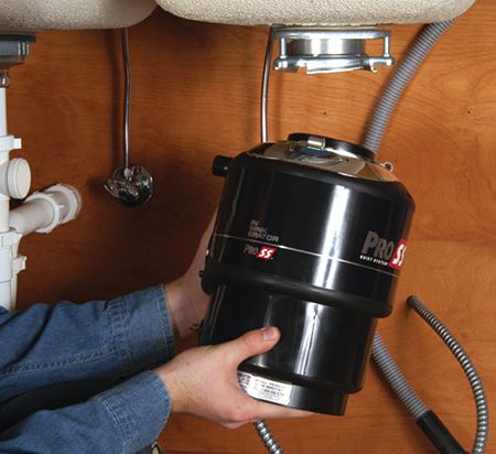 how to replace garbage disposal sink flange