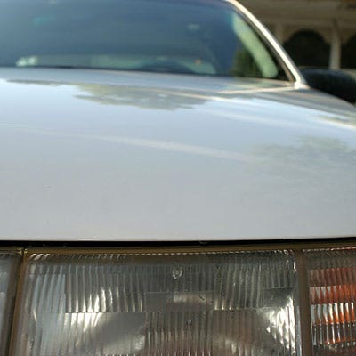 Land vehicle, Vehicle, Car, Automotive exterior, Automotive lighting, Hood, Light, Headlamp, Luxury vehicle, Auto part, car paint repair chips