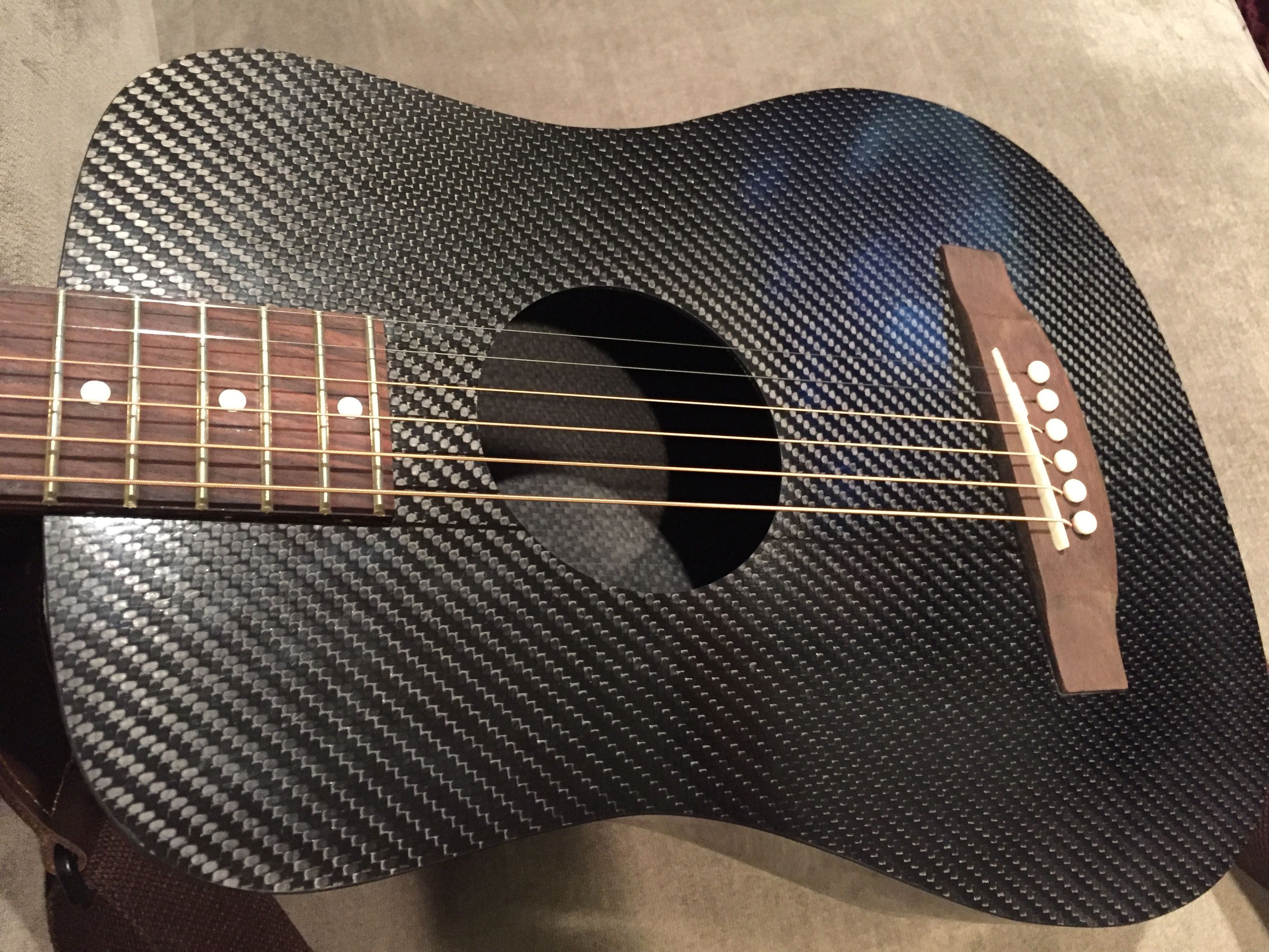 A Carbon Fiber Mini-Guitar Actually Sounds Kind of Great