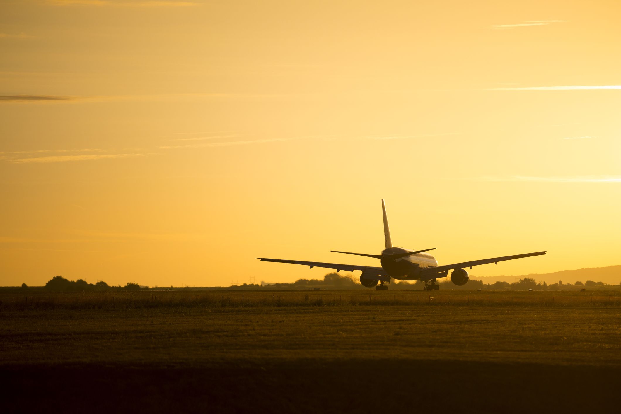 airplanes taking off in the morning