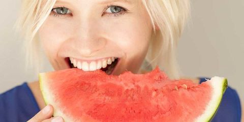 Woman eating watermelon