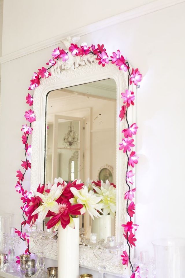 mirror with flowers and lights