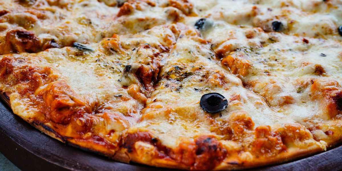 Top Restaurant Critic Says The Tastiest Supermarket Pizza Is From Aldi