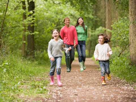 image family walking outdoors