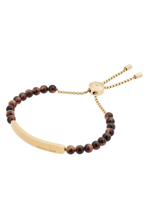 <p>When it comes to work appropriate accessories, simple is always best. A staple bracelet that she can pop on daily will add a perfect touch of class to any outfit, without going over the top.</p><p><strong>Gold-Tone Tortoise Slider Bracelet, $85; <a href="http://www.michaelkors.com/gold-tone-tortoise-acetate-slider-bracelet/_/R-US_MKJ5580?color=0710" target="_blank">michaelkors.com</a></strong>.<br></p>
