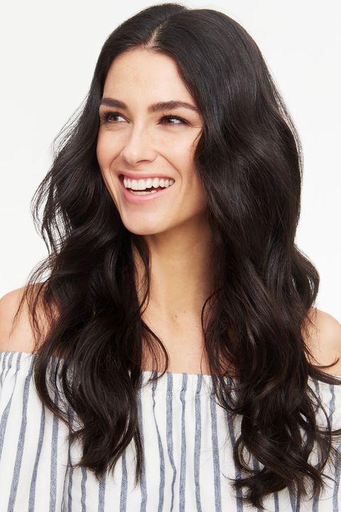 <p>For a polished and relaxed style, do a blowout, then wrap one-inch sections of your hair around a curling wand, making sure not to overlap your strands. After you release the hair, loosen it up with your fingers. For this much fullness, use a volumizing collection like <a href="http://bit.ly/1XyoSPb" target="_blank">Suave Sea Mineral Infusion Shampoo and Conditioner</a> before you blow-dry. </p>