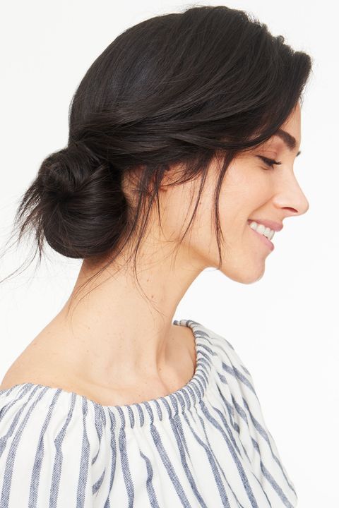 <p>To recreate this versatile updo, separate out a triangle-shaped section of hair in the front, and clip it out of the way. Grab the back and make a ponytail. Tie the tail into a loose knot, and secure it with pins. Now, unclip the sectioned-off hair. Pull it back and wrap it around your bun so that the front is loose and drapey. The result: a beautiful mess. </p><p><br></p><p><em><strong>Banana Republic</strong> Off-Shoulder Stripe Top, <a href="http://bananarepublic.gap.com/browse/category.do?cid=5040&scrollTo=product257454002" target="_blank">$58.00</a>; <strong>Model: </strong>Courtney Davidson/Wilhelmina; <strong>Hairstylist: </strong>Clay Nielsen; <strong>Makeup artist: </strong>Tatyana Makarova. </em><br></p>