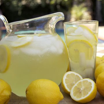 pitcher and glass of lemonade outside