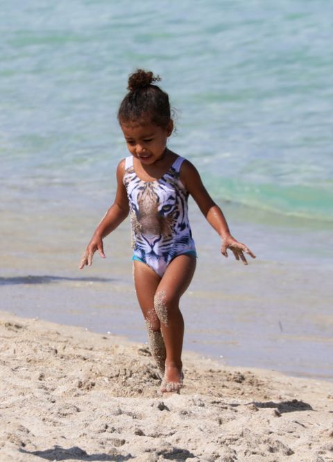 <p>The fashionable toddler had the Miami Beach look on lock this weekend with this adorable tiger swimsuit. </p>