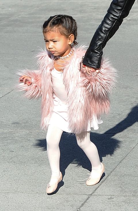 <p>En route to ballet class, Nori sported a pink fur jacket, custom Fallon rose gold choker, and matching pink tights i.e. so <em>not </em>what you wore to pirouette as a kid.</p>