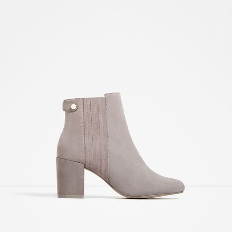 <p>$89.90; <a href="http://www.zara.com/us/en/woman/shoes/boots-and-ankle-boots/elastic-split-suede-ankle-boots-c665040p3610290.html" target="_blank">Zara</a></p>