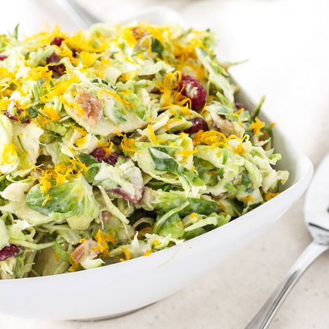 <p>The&nbsp;tangy fruit&nbsp;flavors brighten up the bitterness of the Brussels, making this everyone's new favorite side dish.</p><p><strong data-redactor-tag="strong" data-verified="redactor">Get the recipe at <a href="http://reciperunner.com/cranberry-orange-brussels-sprout-slaw/" target="_blank">Recipe Runner</a>.</strong></p>