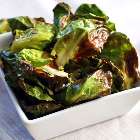 <p>Don't throw away the tough, outer leaves of Brussels sprouts: Put them to work in these crunchy, salty chips.</p><p><strong data-redactor-tag="strong" data-verified="redactor">Get the recipe at <a href="http://thecuriouscoconut.com/blog/brussels-sprouts-chips" target="_blank">The Curious Coconut</a>.</strong></p>