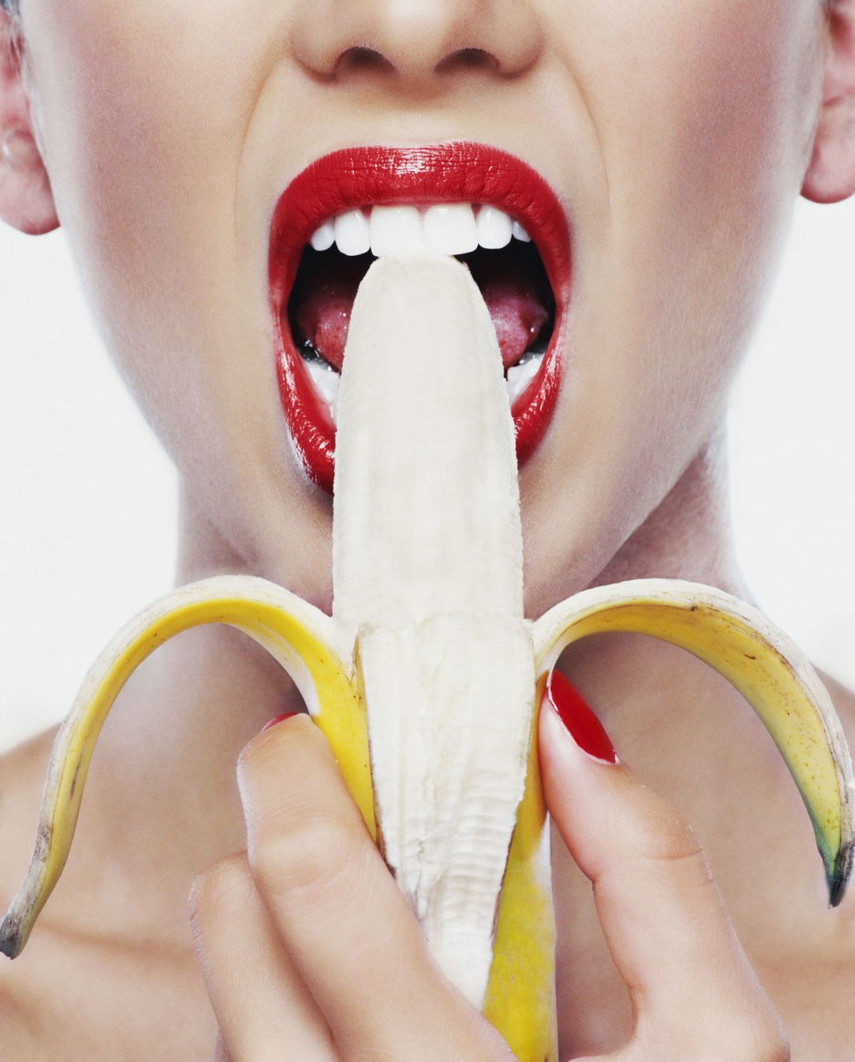 woman eating banana lipstick