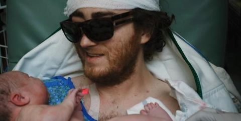 terminally ill dad leaves ICU to see newborn son